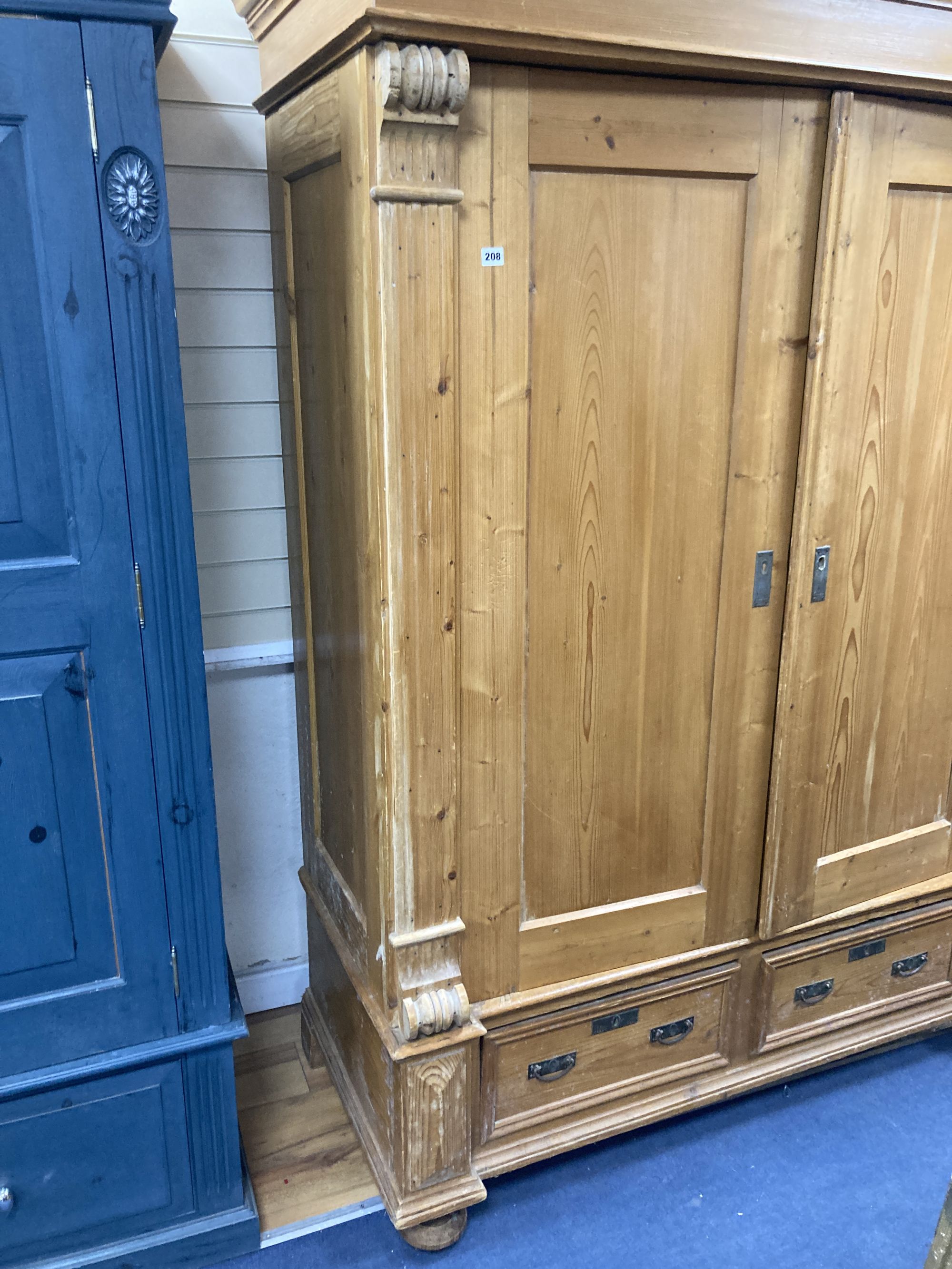 A 19th century East European pine armoire, width 150cm depth 66cm height 203cm